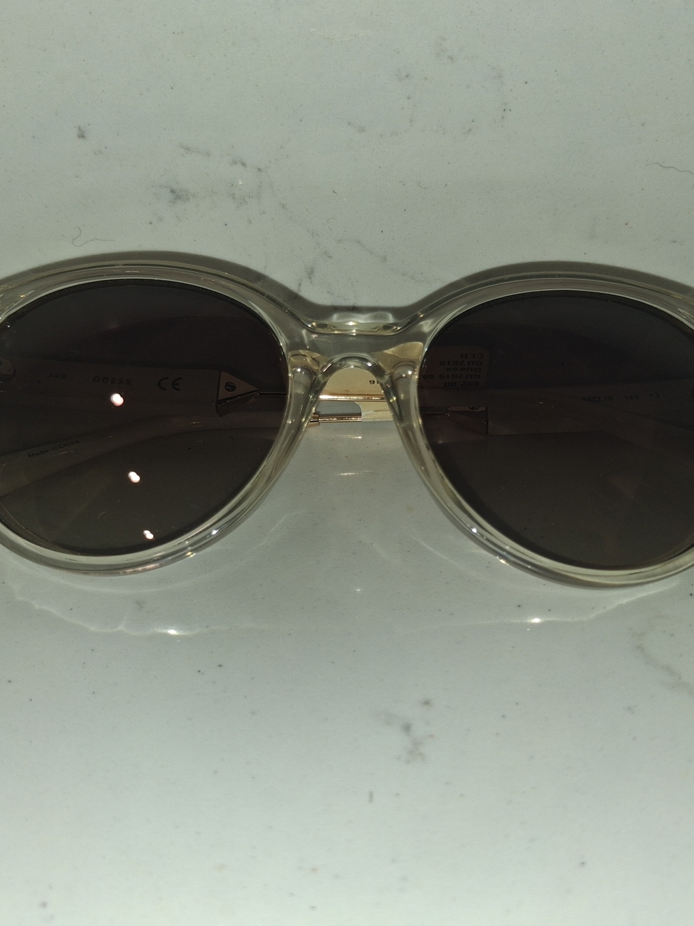 Guess GU7619 26G clear-brown sunglasses. [1]